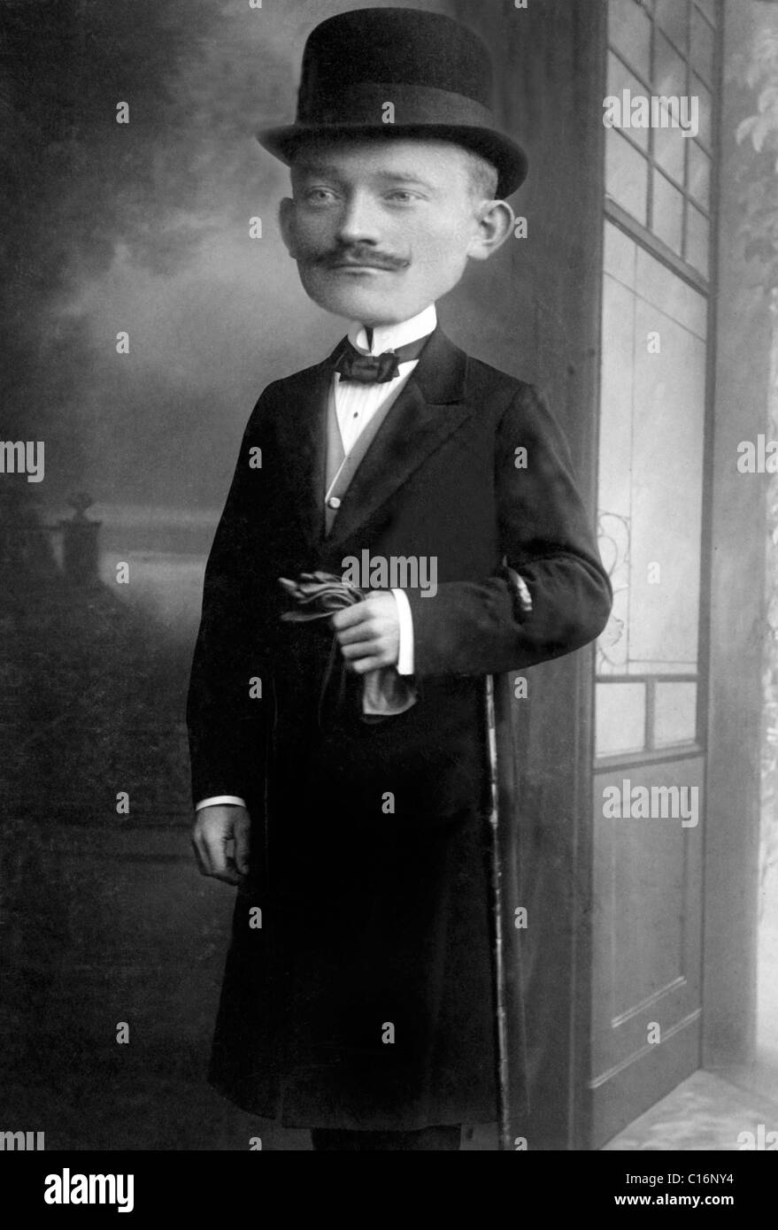 Historic photograph, man with a giant head Stock Photo Alamy