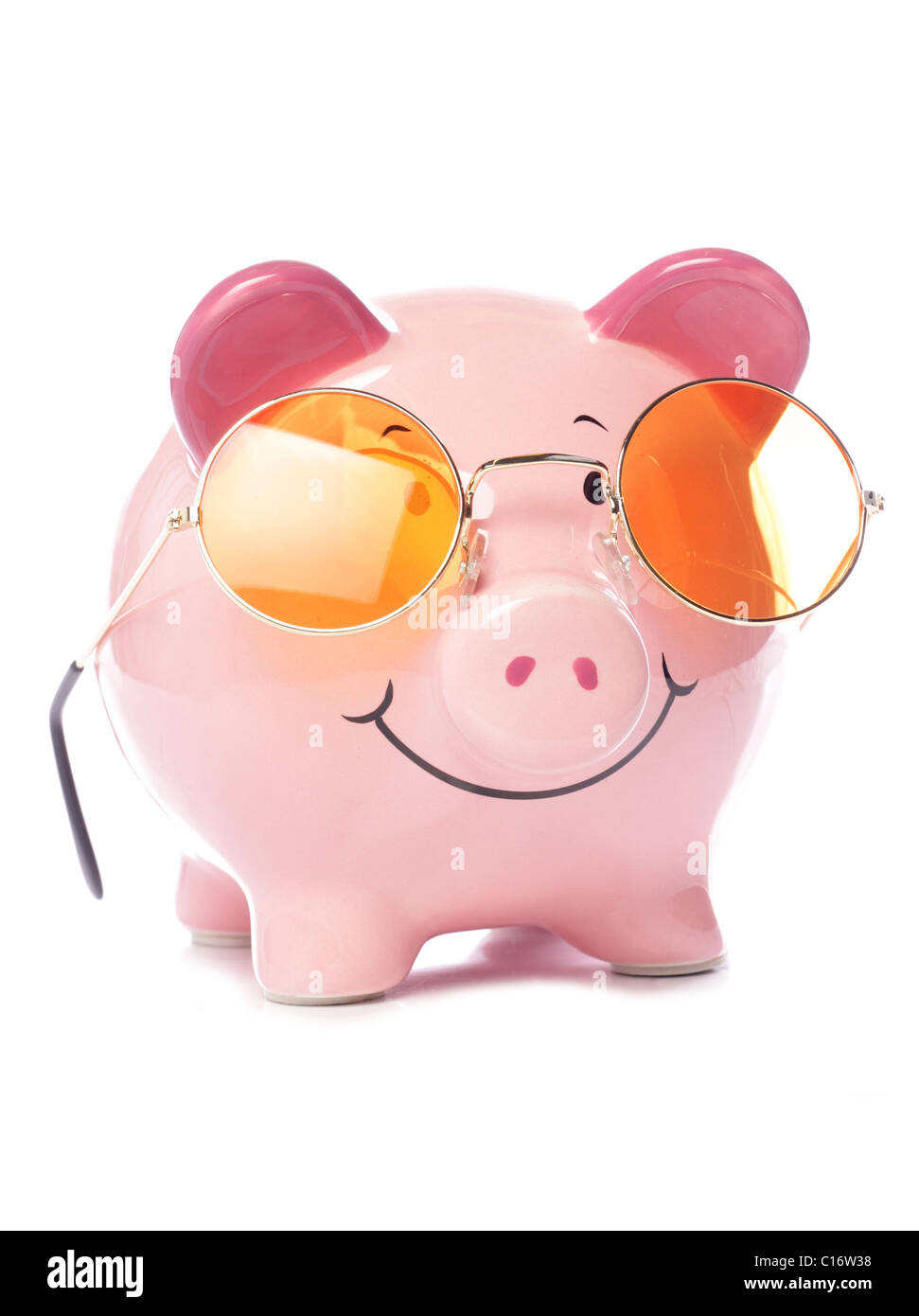 Piggy bank wearing retro sunglasses studio cutout Stock Photo