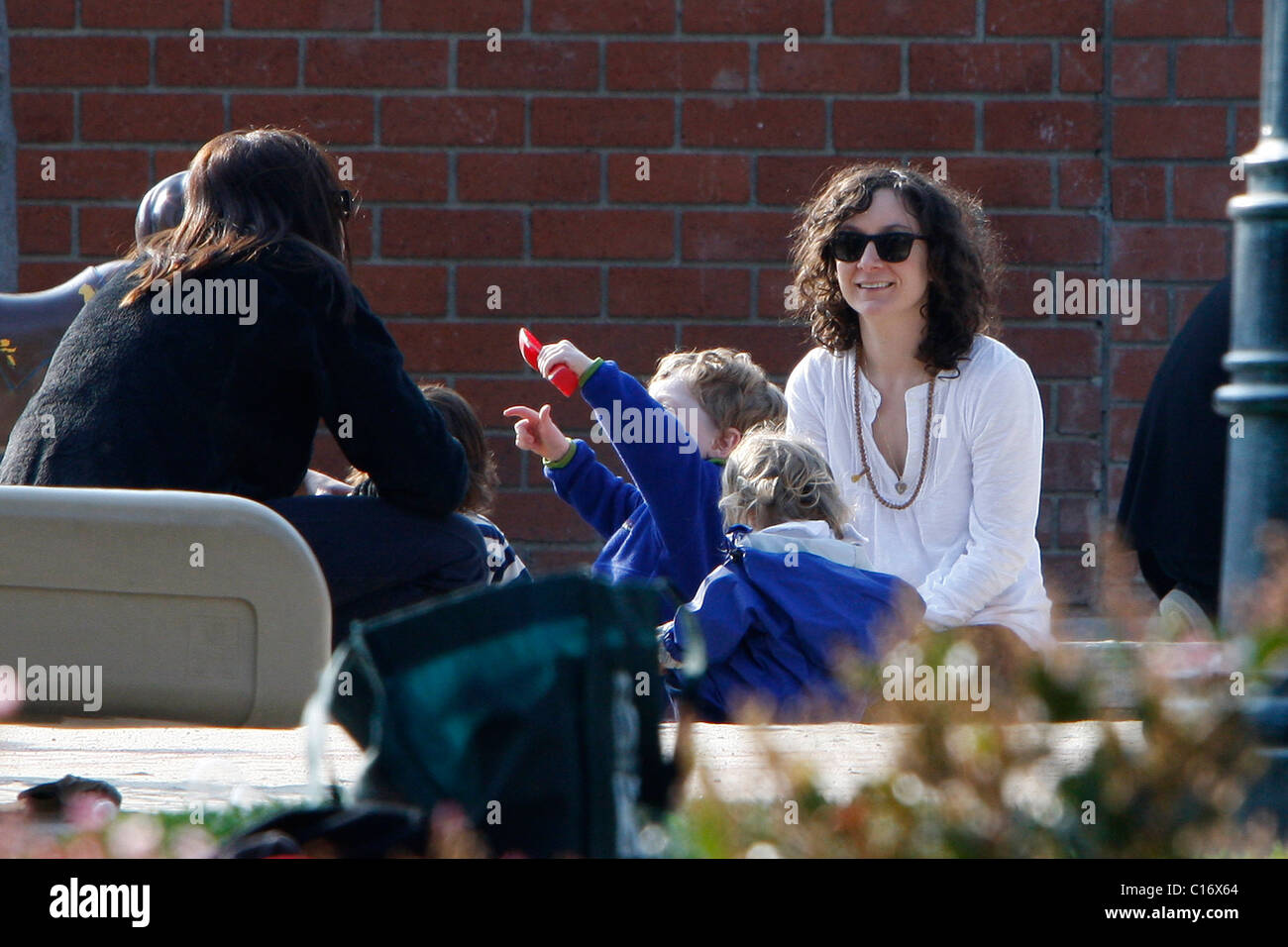 Sara Gilbert with her daughter Sawyer and her partner Allison Adler at
