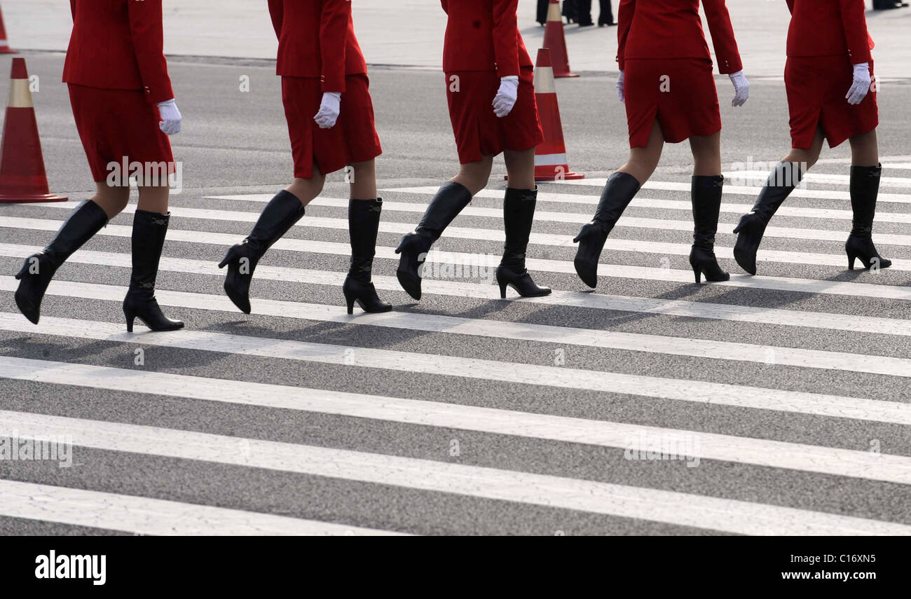 Chinese air hostesses pose in the capital, Beijing.  Beijing, China - 10.03.09  ** ** Stock Photo