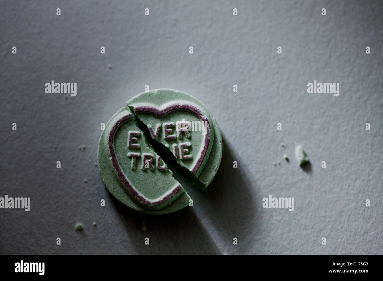 A broken love heart sweet with the message 'Ever True' Stock Photo