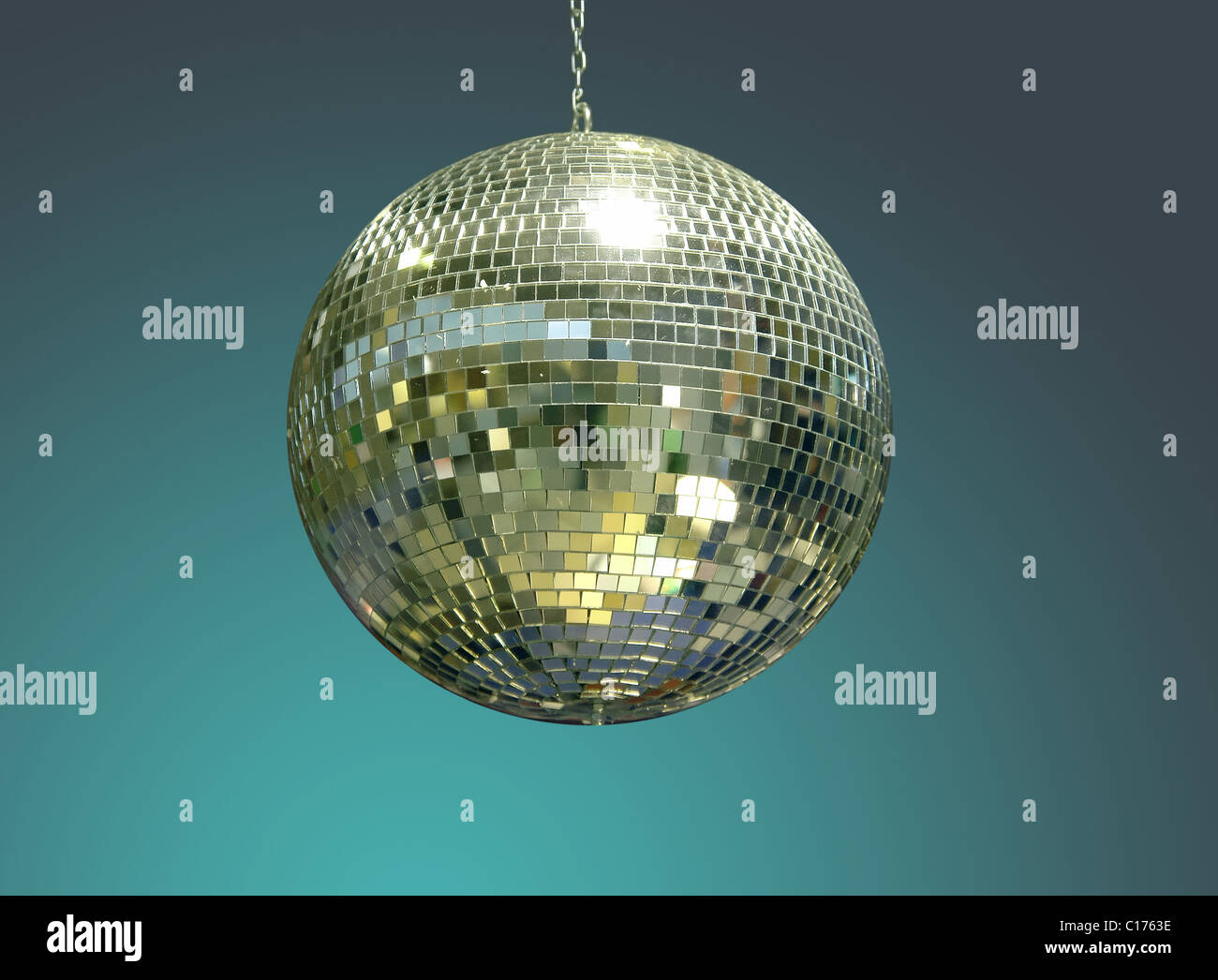 Glistering disco ball over dark green background Stock Photo Alamy
