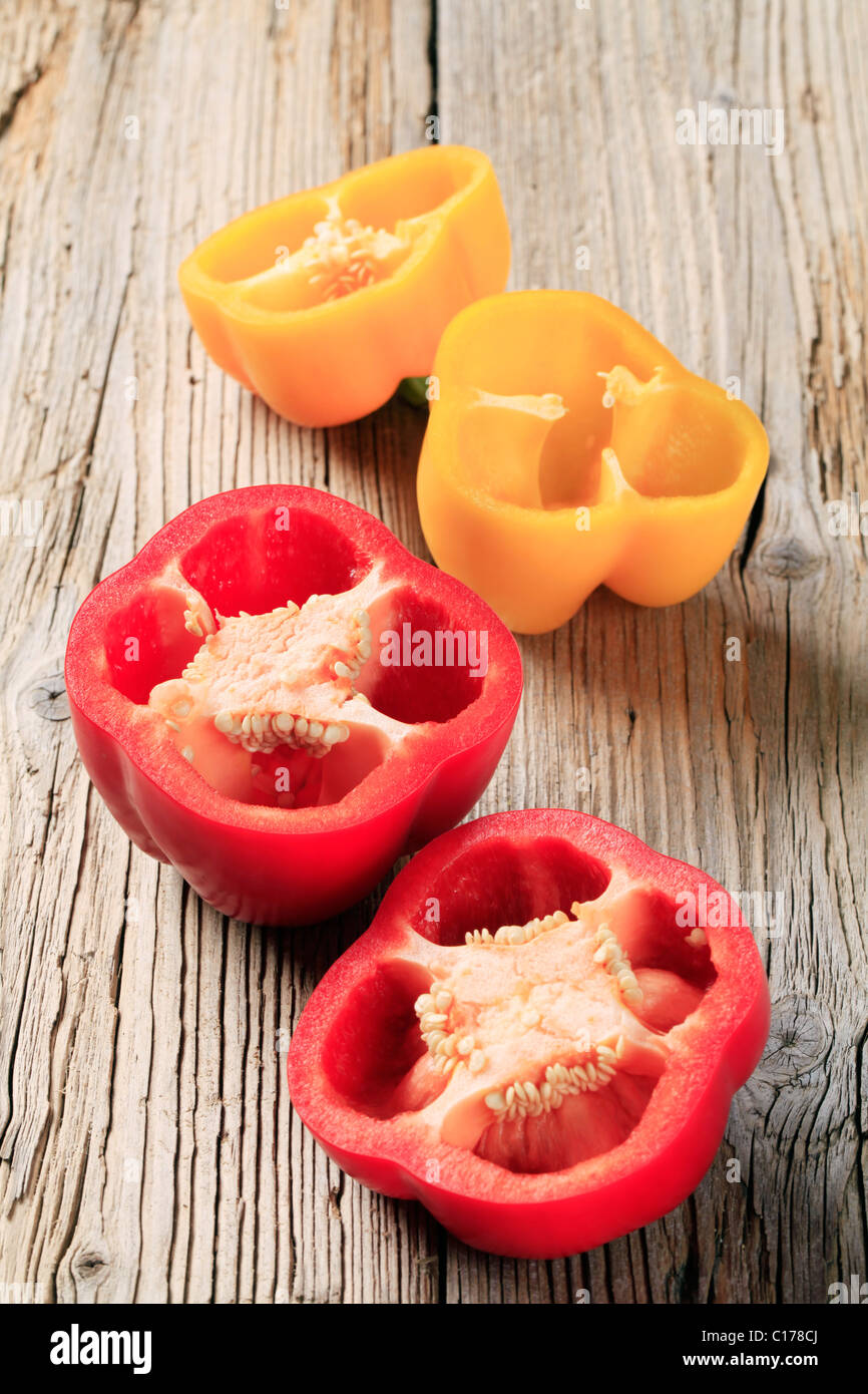 Halves of fresh red and yellow peppers Stock Photo - Alamy