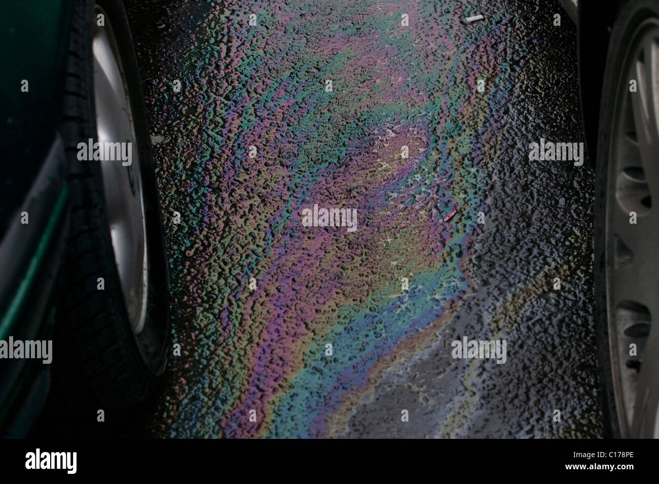 Petrol leaking from old tank of car Stock Photo Alamy
