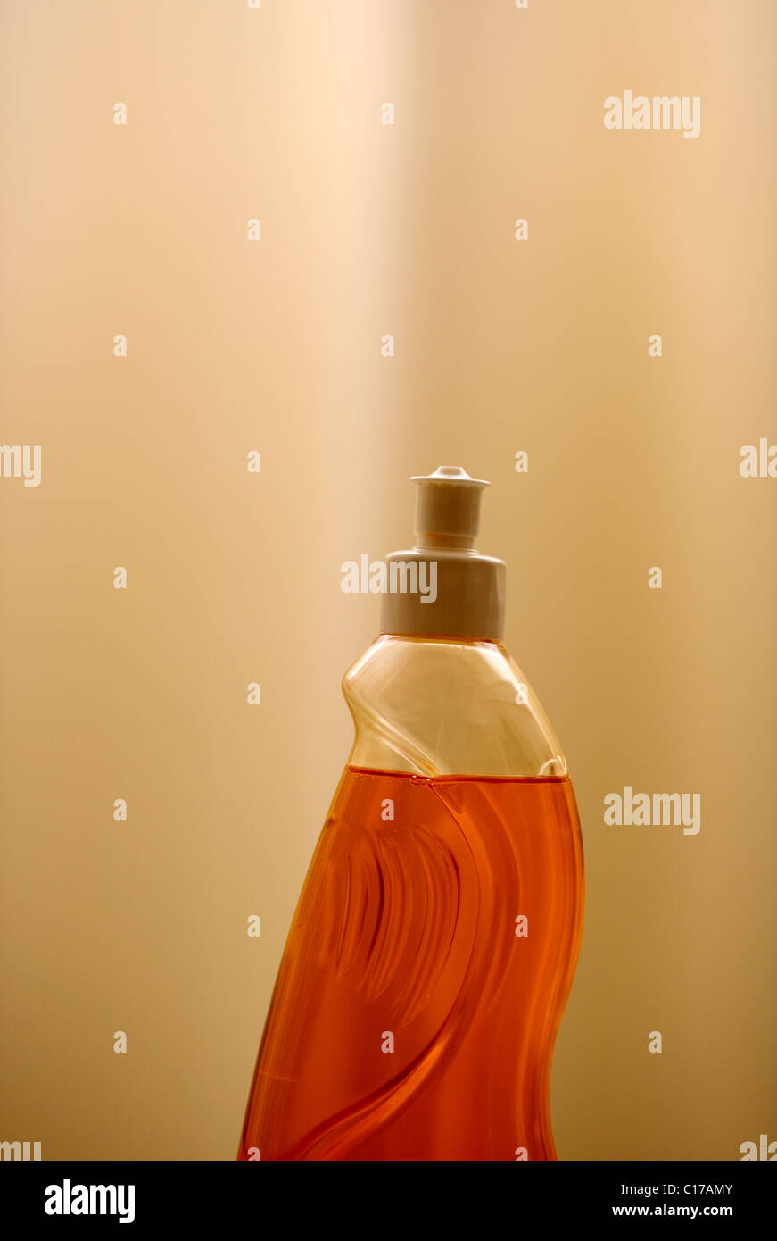 Container bottle of orange washing liquid Stock Photo Alamy