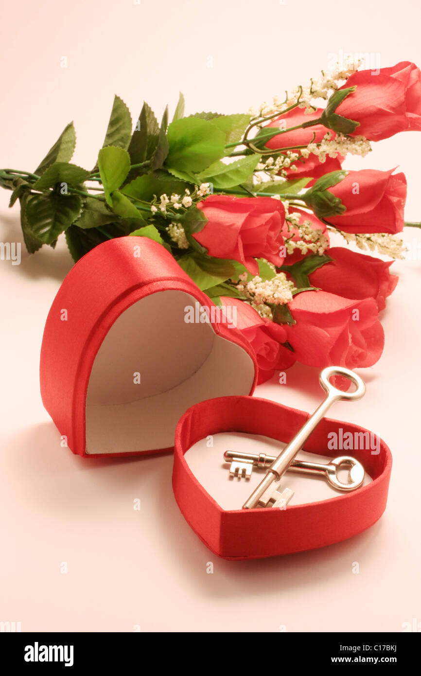 Keys in heart-shaped gift box Stock Photo
