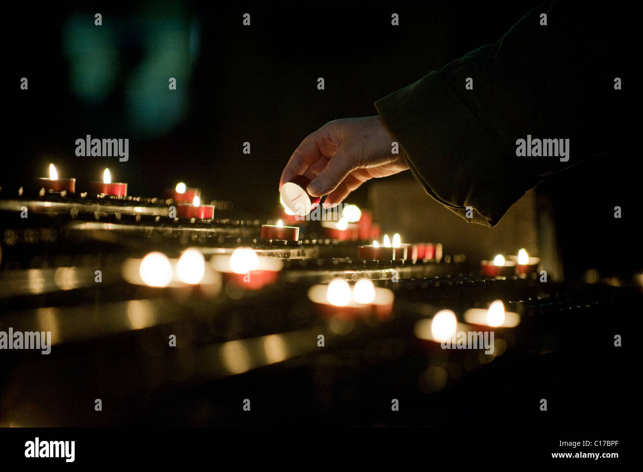 Lighting Candle Catholic Church Stock Photos & Lighting Candle Catholic