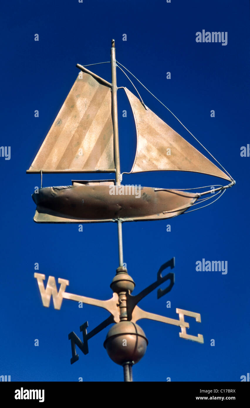 Weather vane with a sailing boat Stock Photo