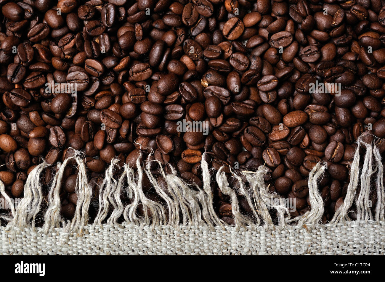 Background of gray rag and coffee beans Stock Photo - Alamy
