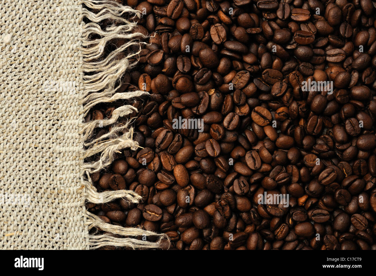 Background of gray rag and coffee beans Stock Photo - Alamy
