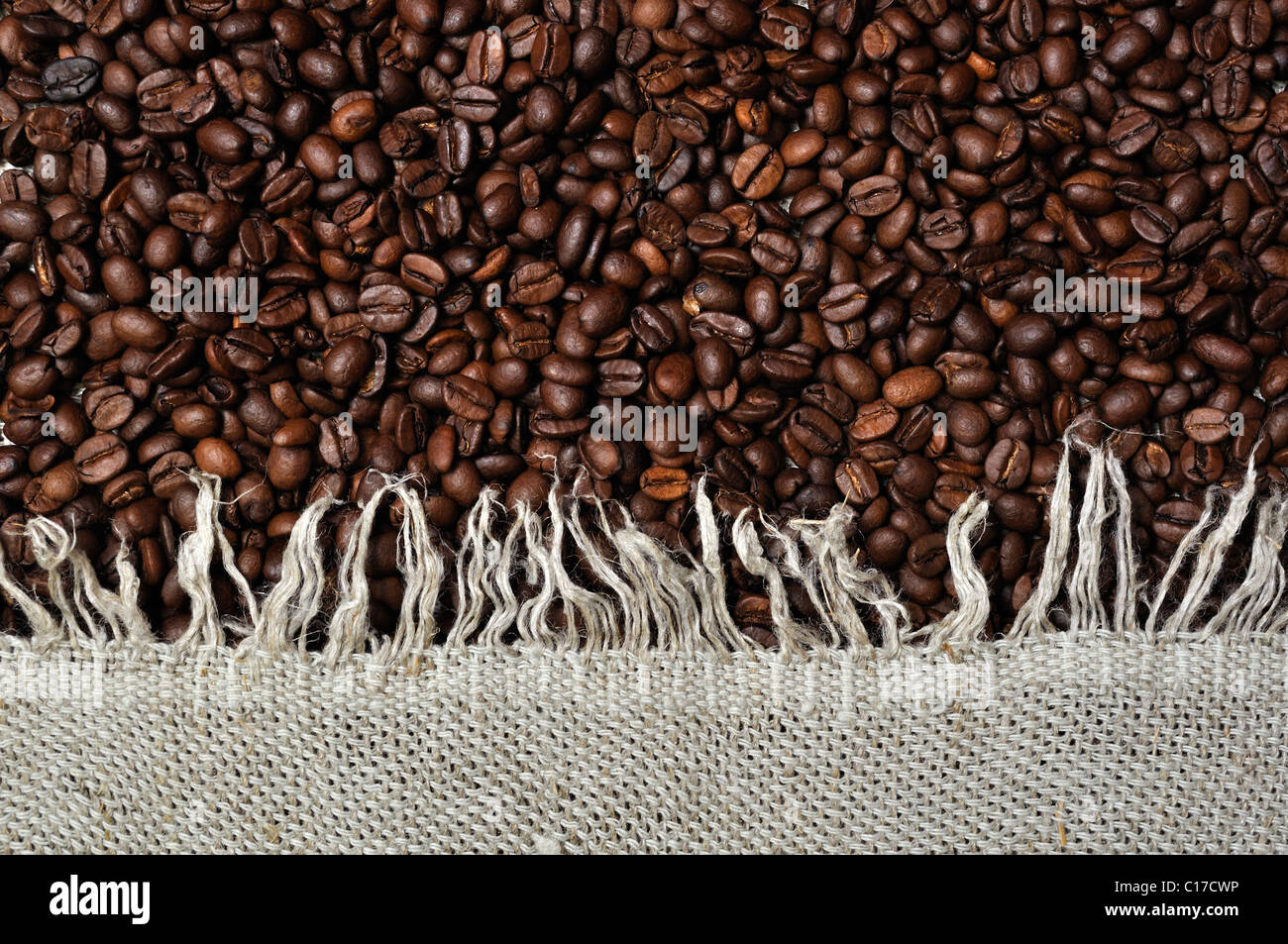 Background of gray rag and coffee beans Stock Photo - Alamy