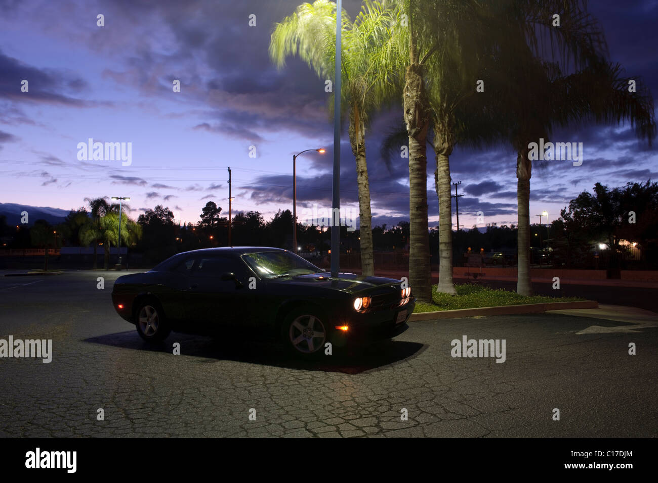 Black 2010 Dodge Challenger retro muscle car at twilight in Lake Elsinore California Stock Photo
