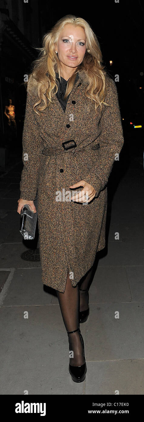 Caprice bourret leaving beach blanket hi-res stock photography and