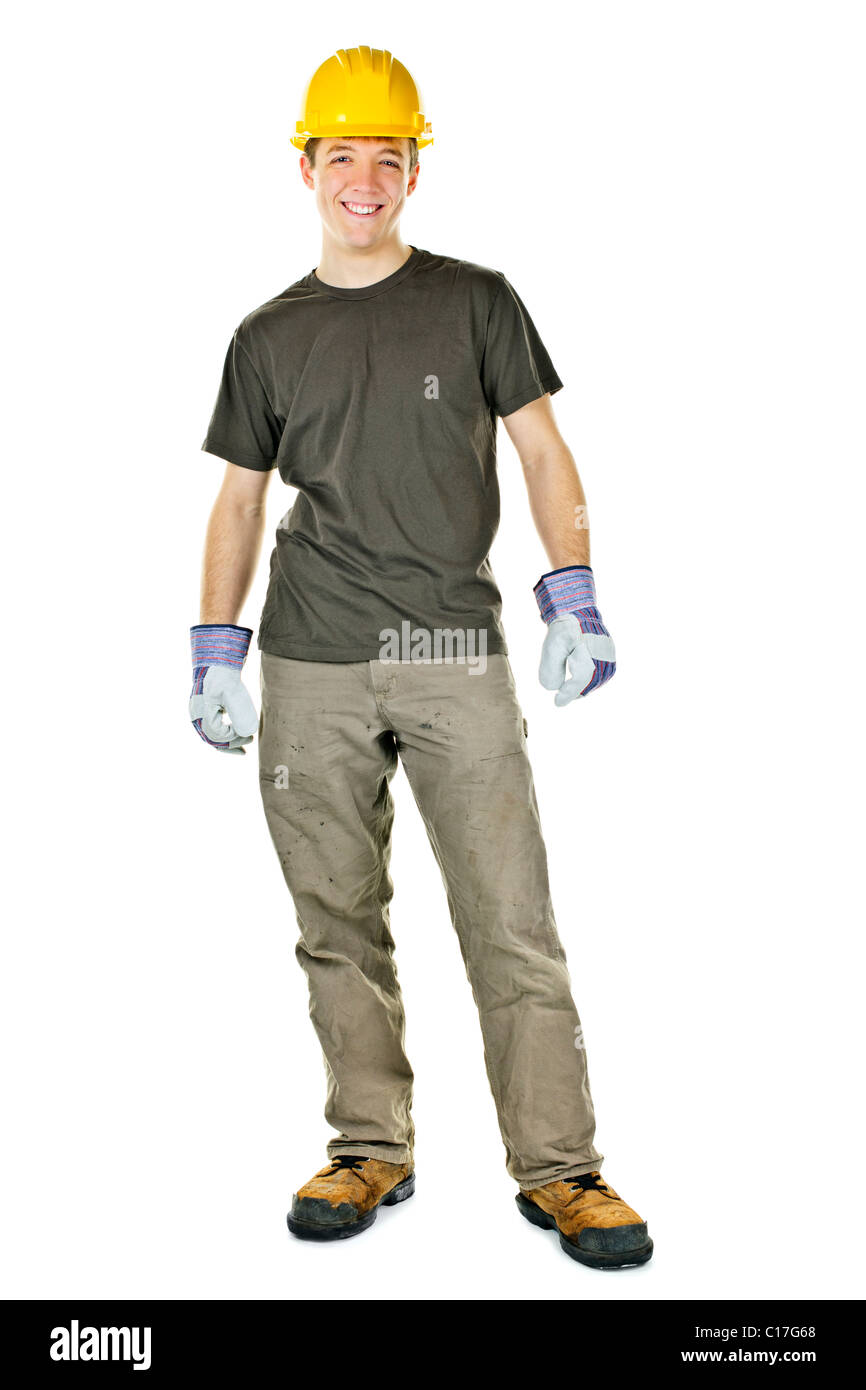 Young construction worker with hard hat full body standing isolated on white background Stock Photo