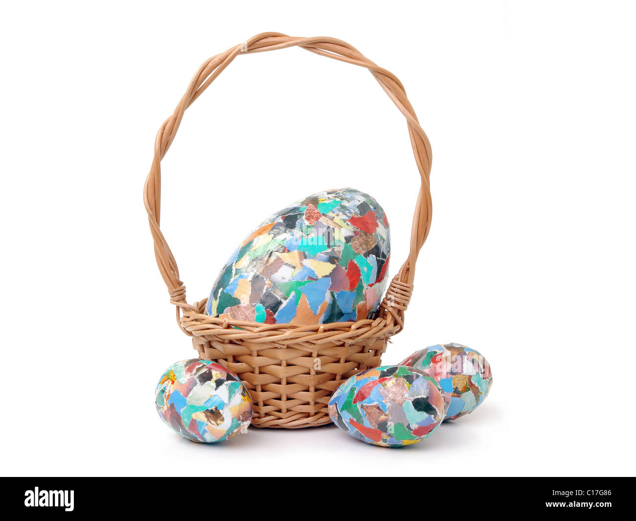 Giant easter collage egg in wicker basket and three smaller collage
