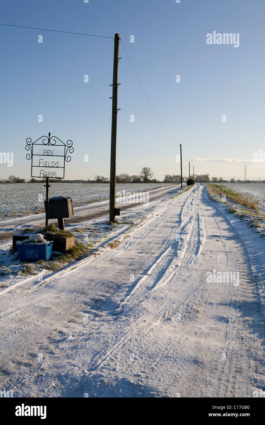 Snow covered farm track Stock Photo