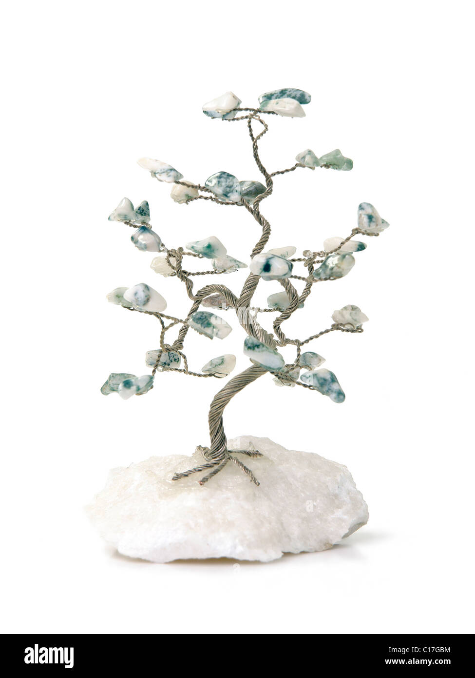 Artificial metal tree with agate stones over white background Stock Photo