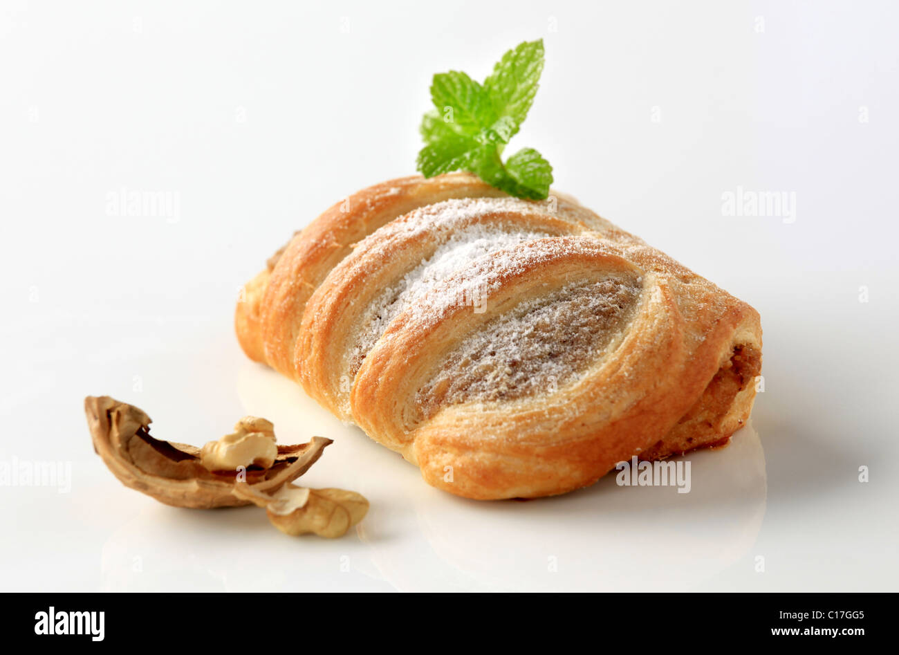 Sweet puff pastry roll with nut filling Stock Photo Alamy
