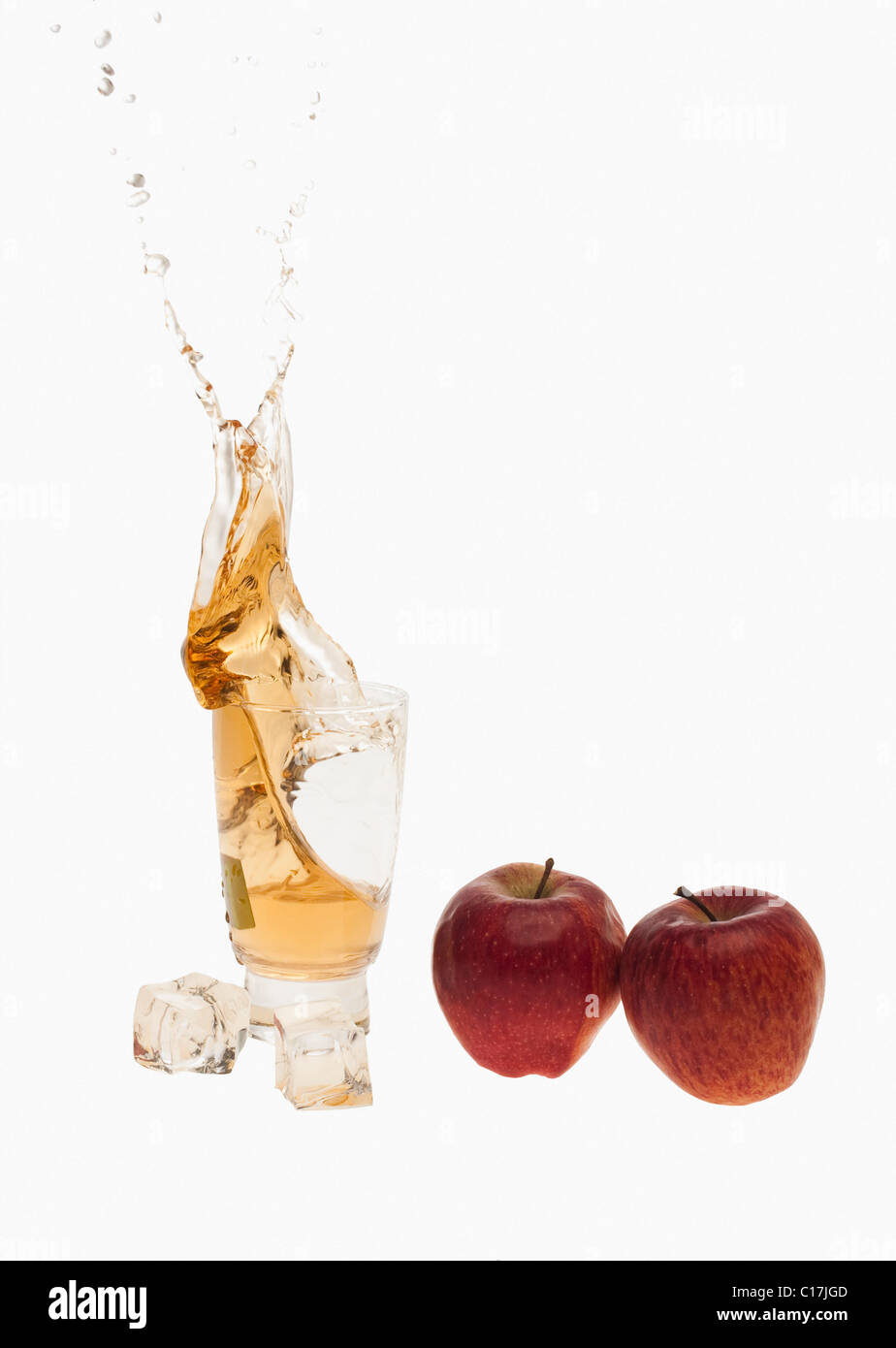 Close-up of apples and a glass of apple juice Stock Photo