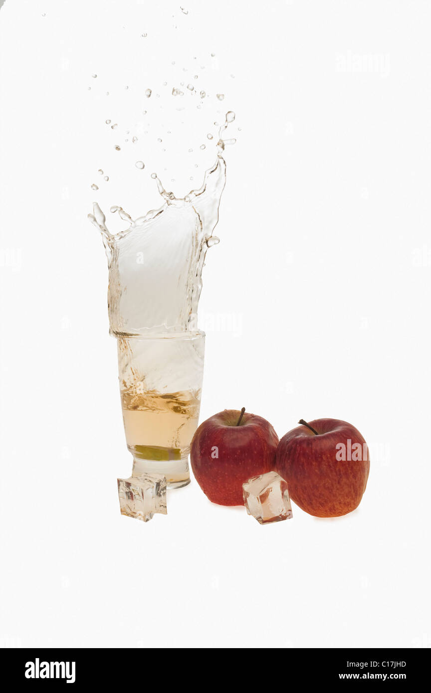 Close-up of apples and a glass of apple juice Stock Photo