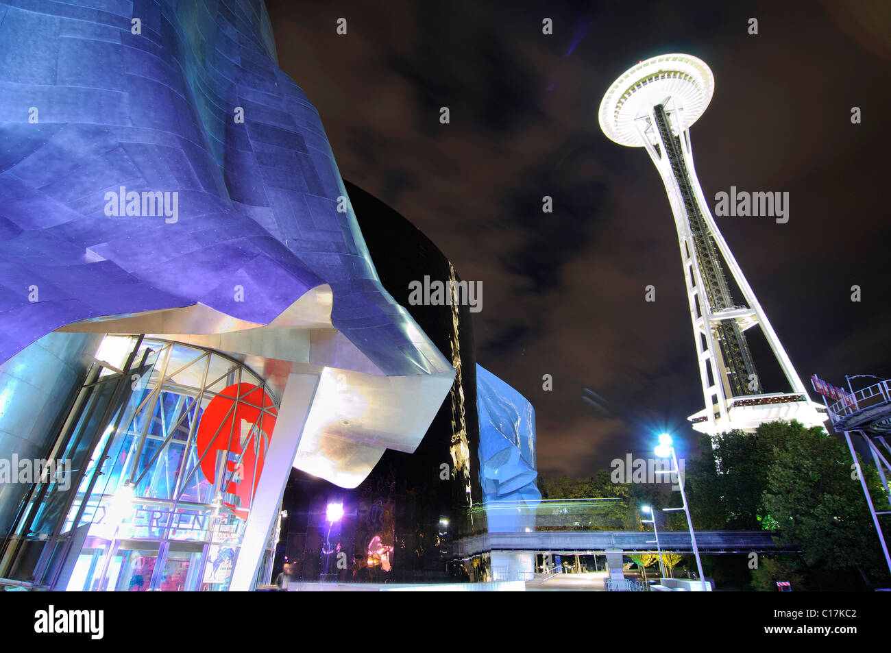 Space Needle next to the building of the Experience Music Project, EMP, and the Science Fiction Museum, SFM, Seattle center Stock Photo