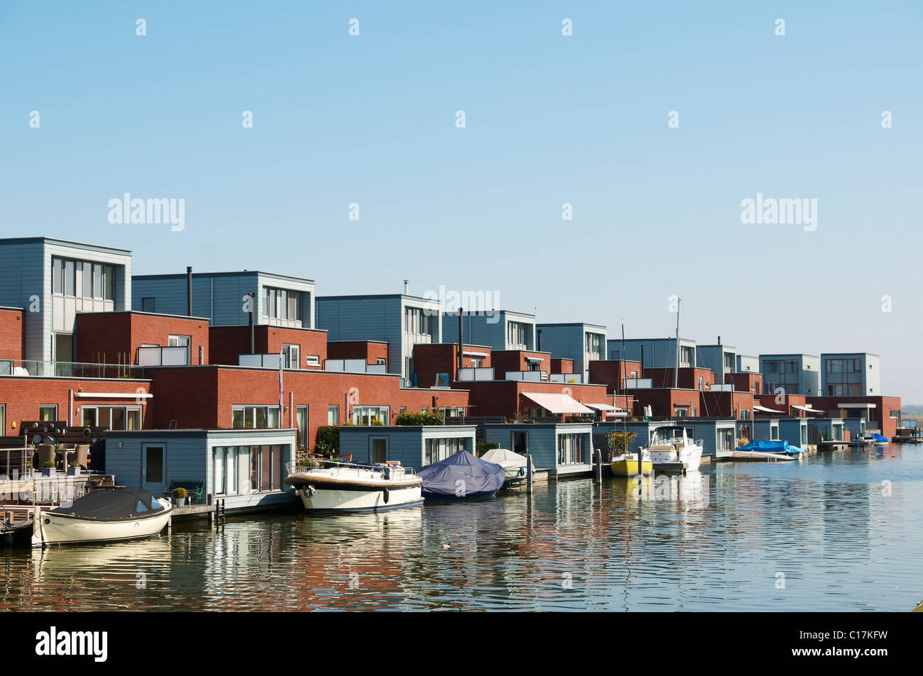 Living at the water with a boat in Almere (The Netherlands) Stock Photo