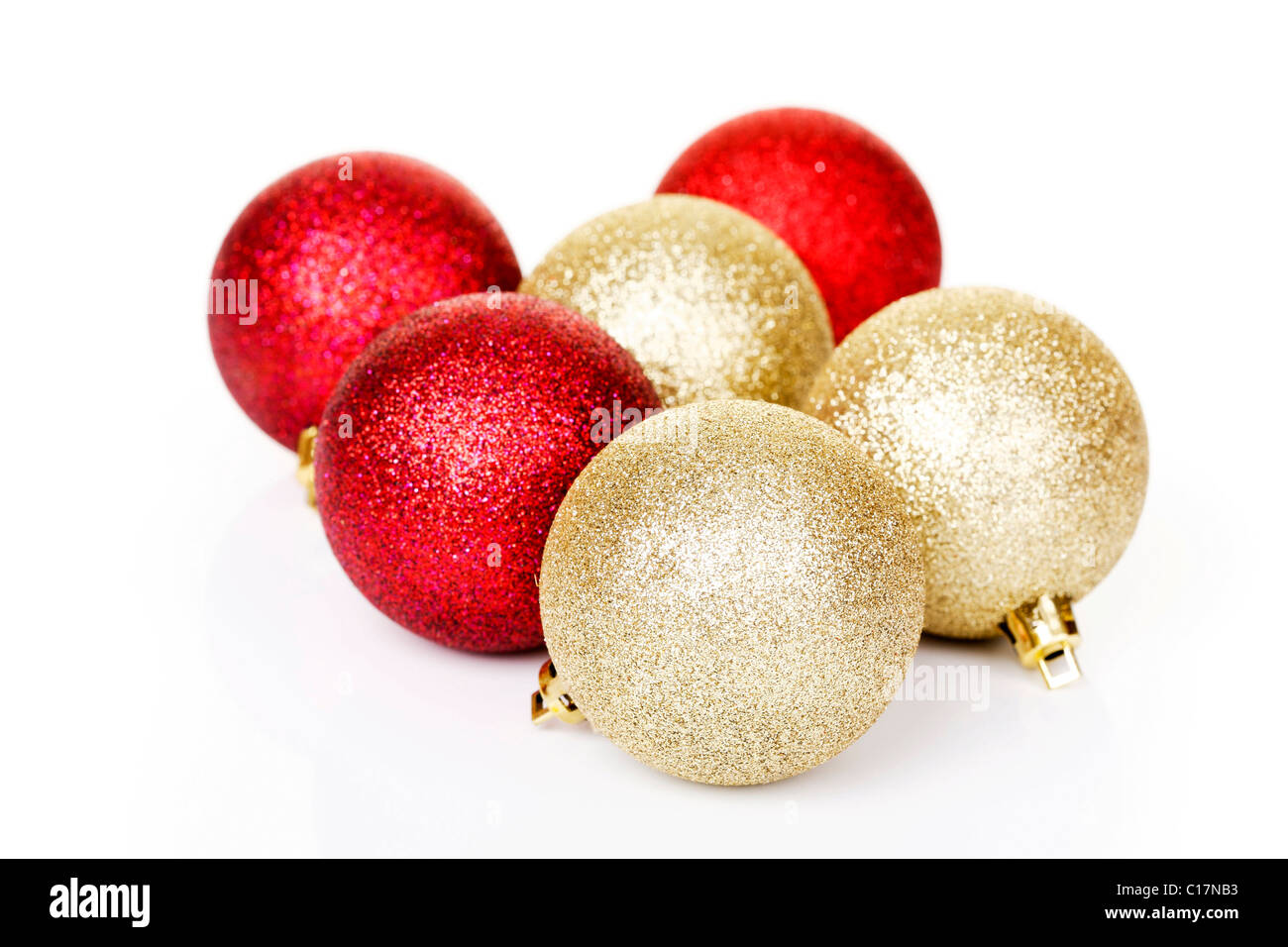Gold and red Christmas tree ornaments Stock Photo - Alamy