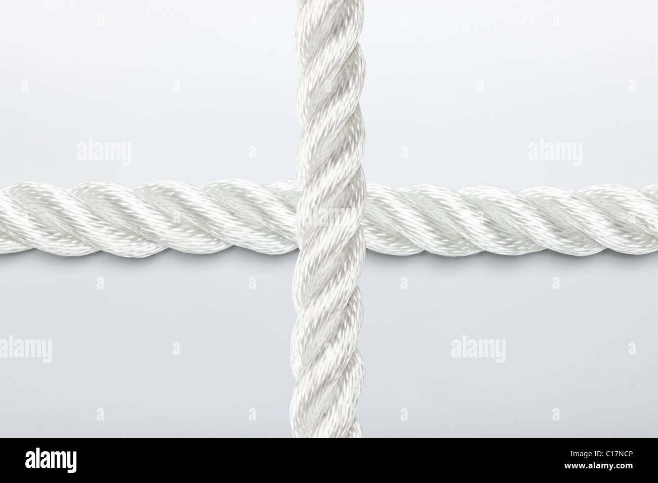 Rope cross overlapping white hires stock photography and images Alamy