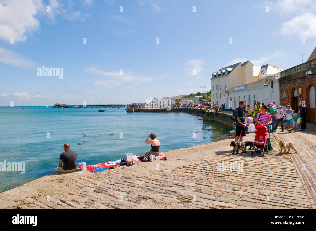Holidaymakers on a sunny afternoon at Swanage Quay in Dorset, England, UK Stock Photo