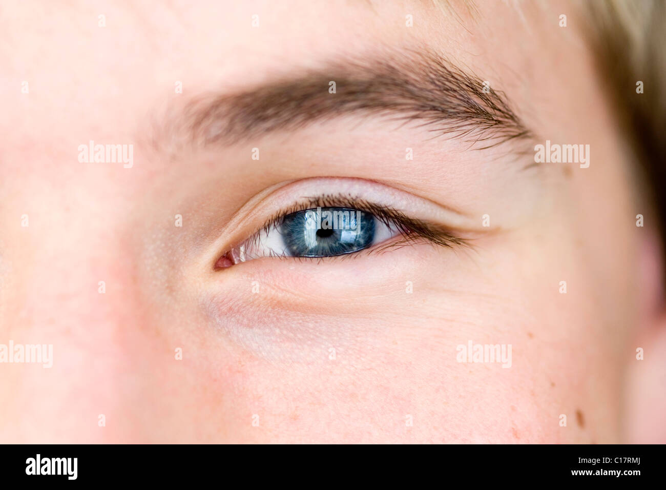 Eye, blue color of a young man Stock Photo