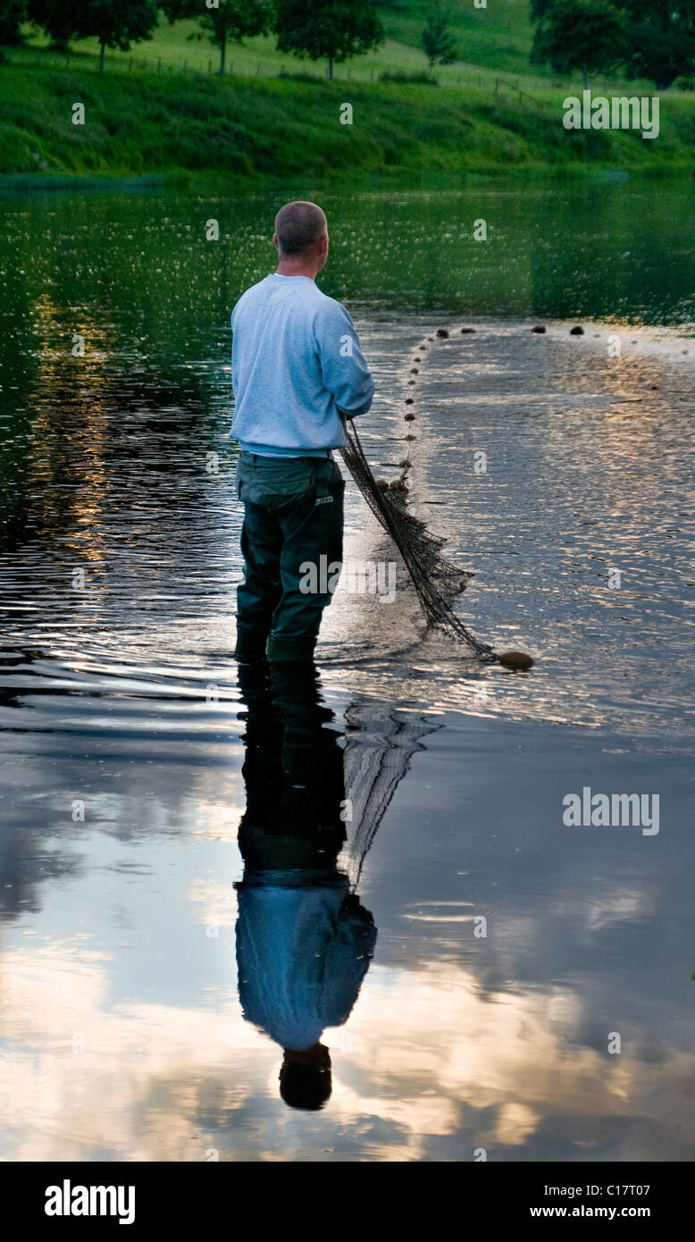 Salmon netter on the River Tweed Stock Photo Alamy