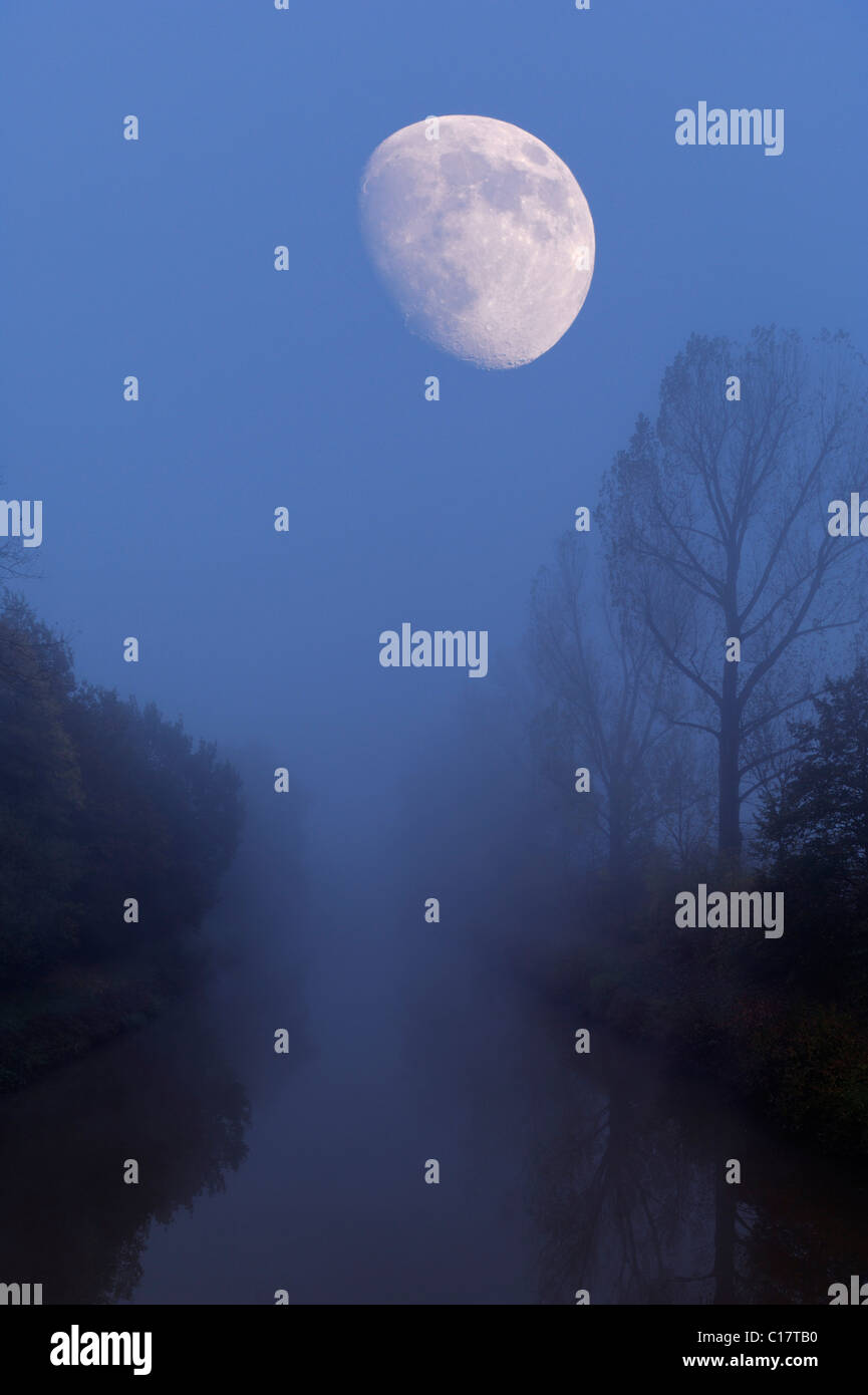 River landscape with the moon, composing Stock Photo - Alamy