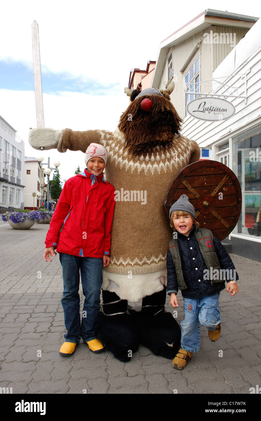 Children with a fake Viking, Akureyri, Iceland, Europe Stock Photo