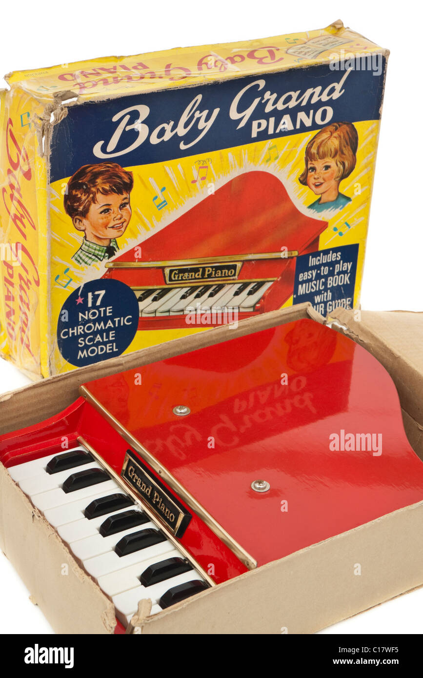Vintage 1960's red Baby Grand Piano toy with original box Stock Photo -  Alamy