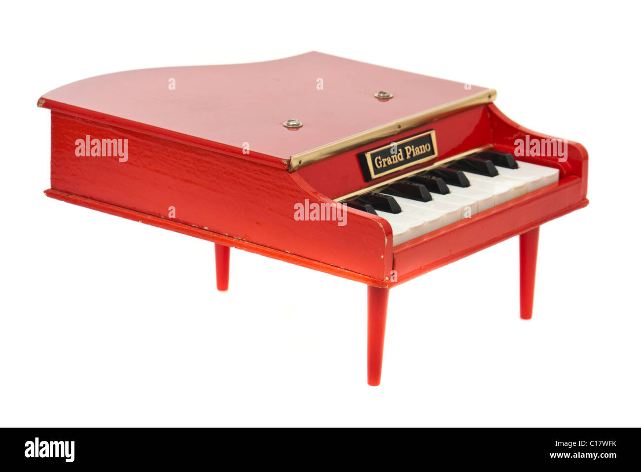 Vintage 1960's red 17-note Baby Grand Piano toy Stock Photo