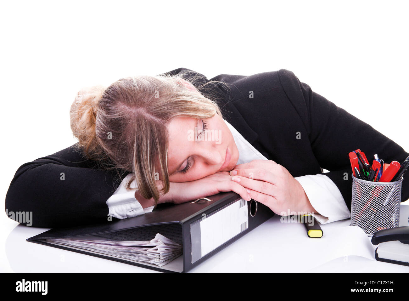 Woman wearing a costume in the office, sleeping Stock Photo