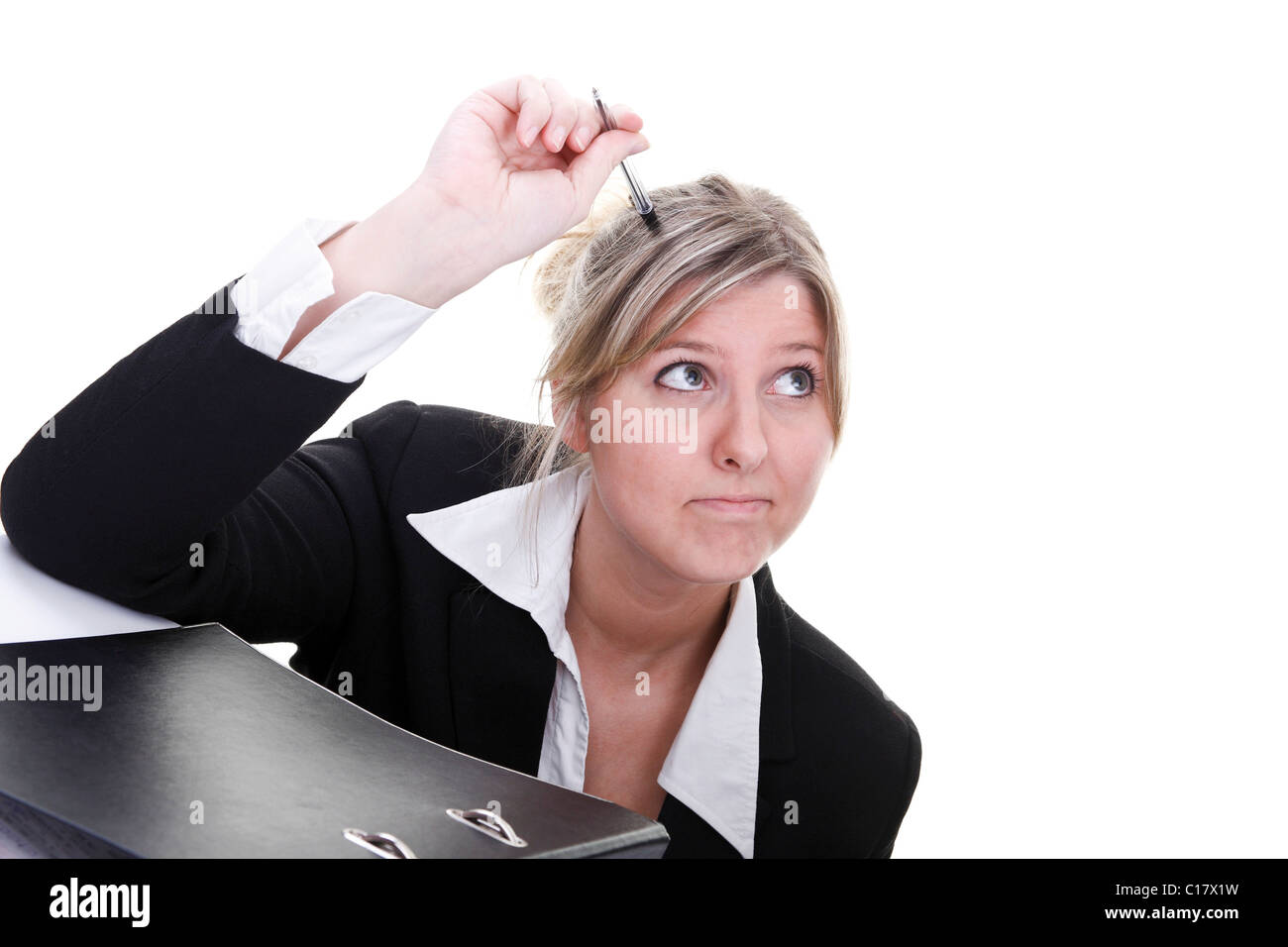 Woman wearing a costume in the office, pensive Stock Photo