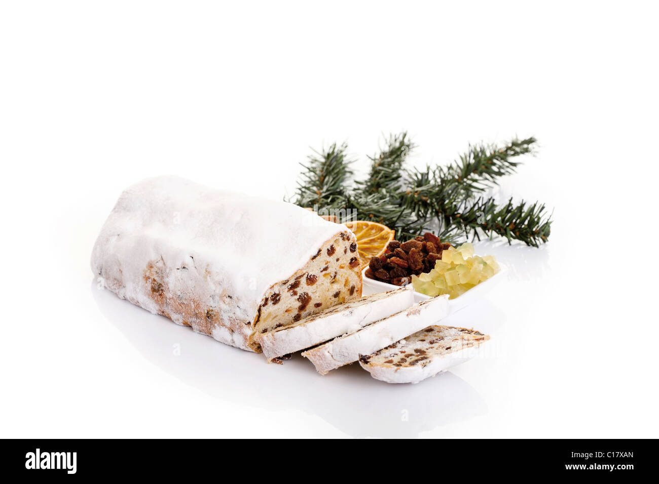 Butter almond Christmas stollen with ingredients and decoration Stock Photo