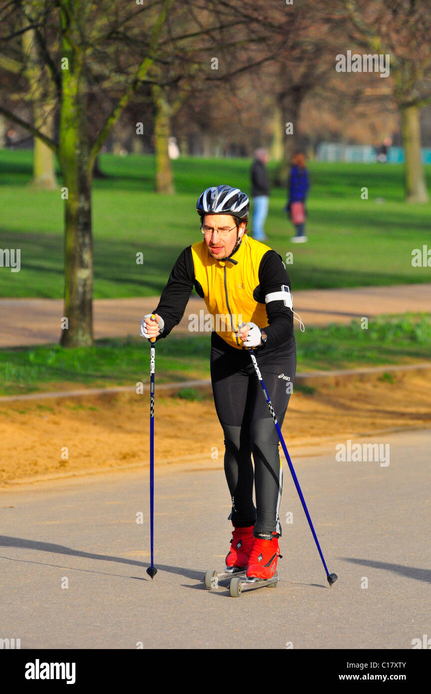 Man roller Skiing in Hyde Park, London Stock Photo Alamy