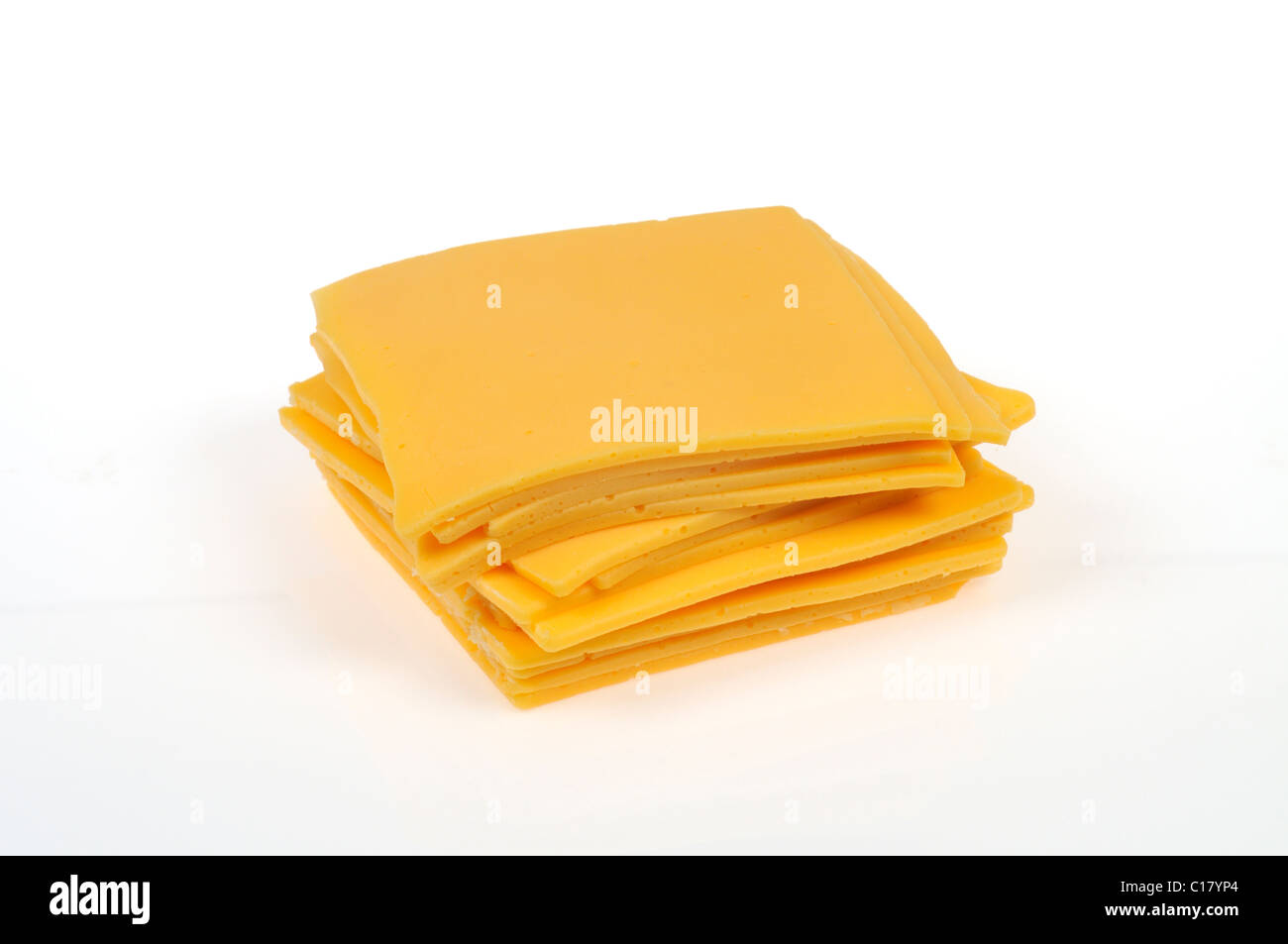 A stack of slices of  cheese on white background, cutout Stock Photo