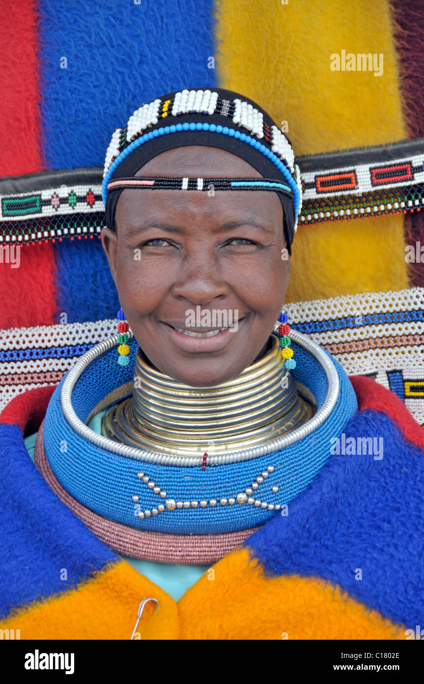 Woman from the Ndebele tribe, also called Matabele or AmaNdebele, wearing the traditional costume of a married woman Stock Photo
