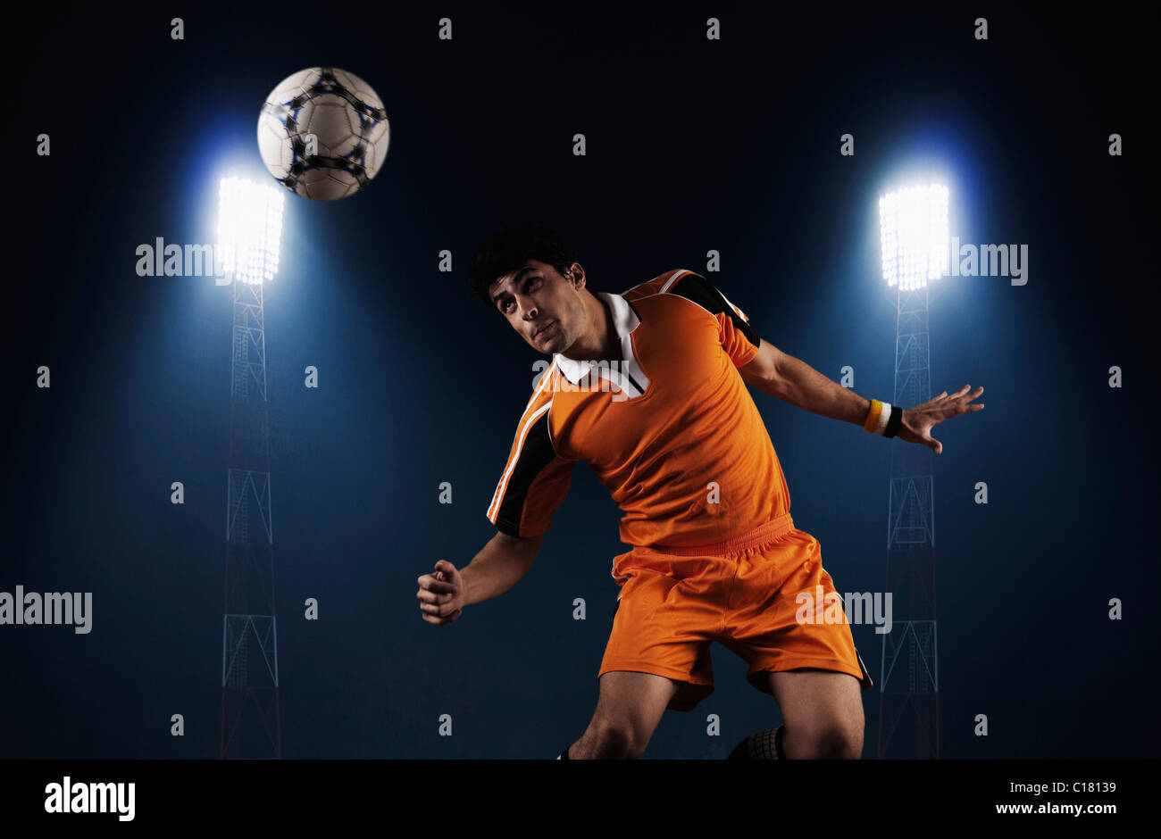 Soccer player heading a soccer ball Stock Photo Alamy