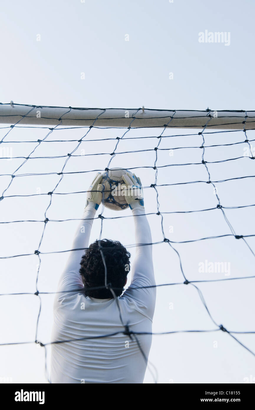 Goalie defending the goal Stock Photo