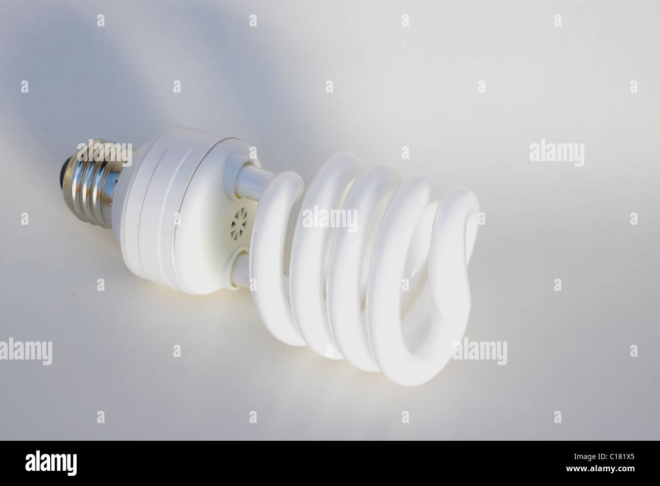 Energy saving compact fluorescent lamp green energy cfl Stock Photo Alamy
