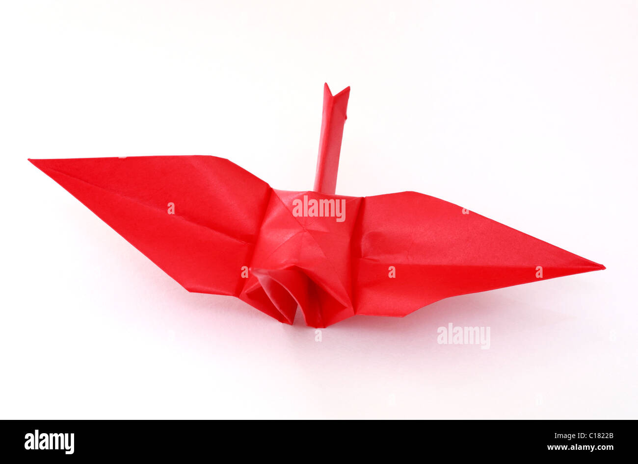 Close-up of a red origami bird. Stock Photo