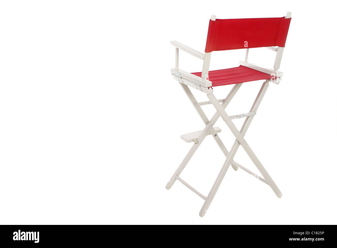 Director's chair with red seat and back on a white frame. Isolated on white background. Copyspace room on left for text. Stock Photo