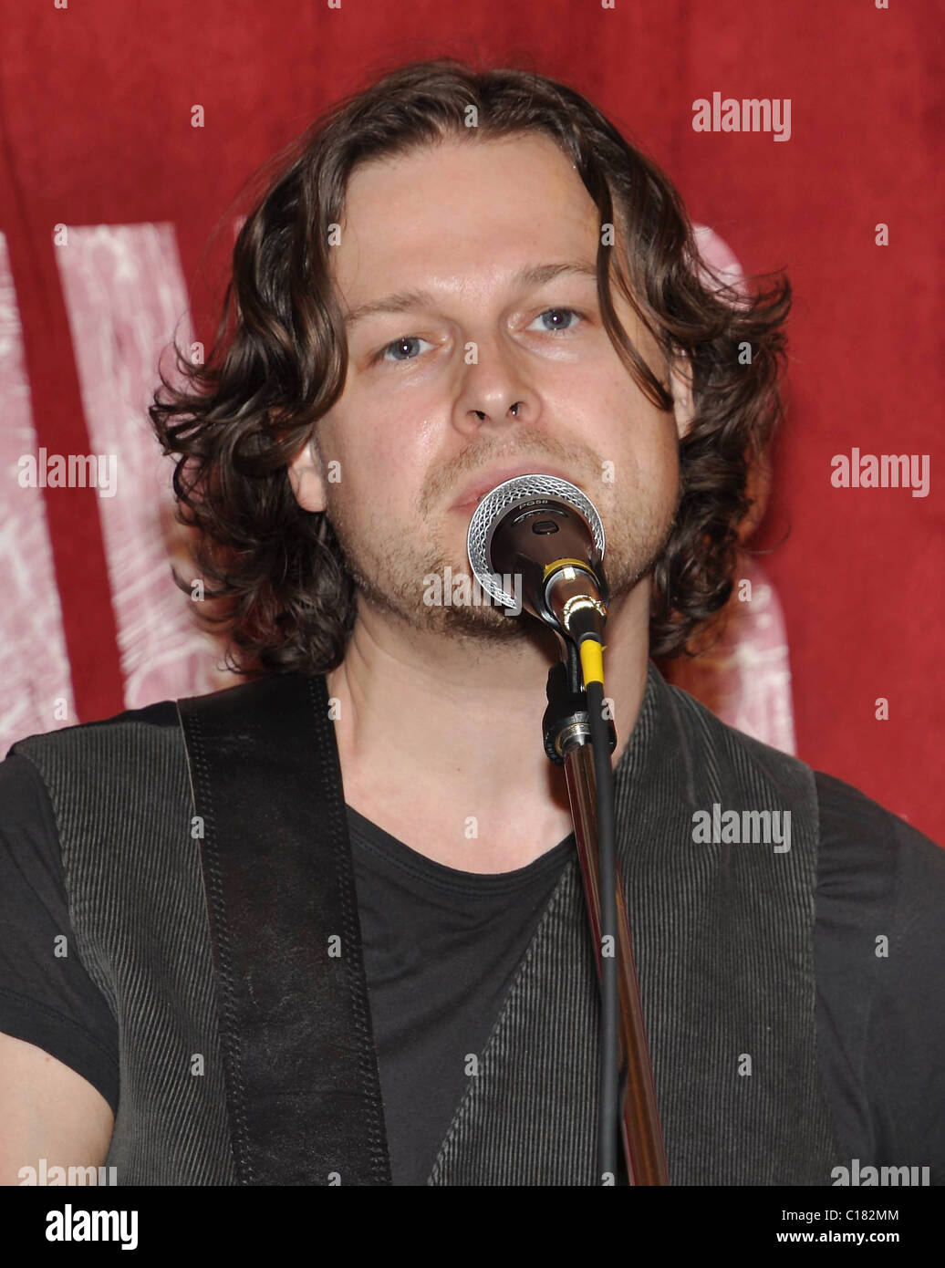 Colin Devlin performing songs from his 'Democracy of One' solo album at