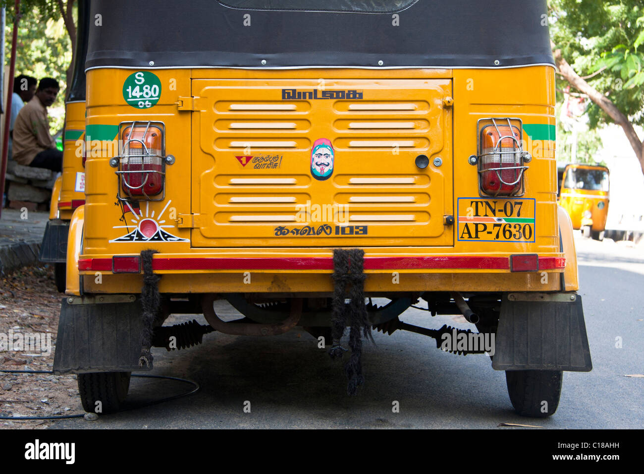 Back of an Indian yellow auto rickshaw Stock Photo