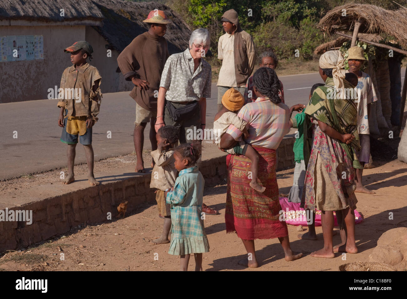 Roadside stopover near Fianarantoa.Tourist meeting with local villagers. Southern central Madagascar. Stock Photo