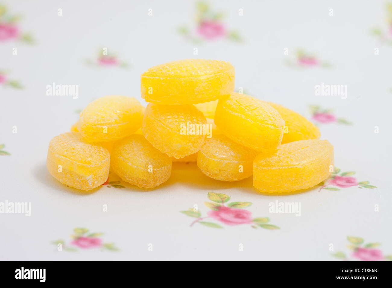 sherbet lemons, sweets and candy on a paper background photographed in a studio Stock Photo